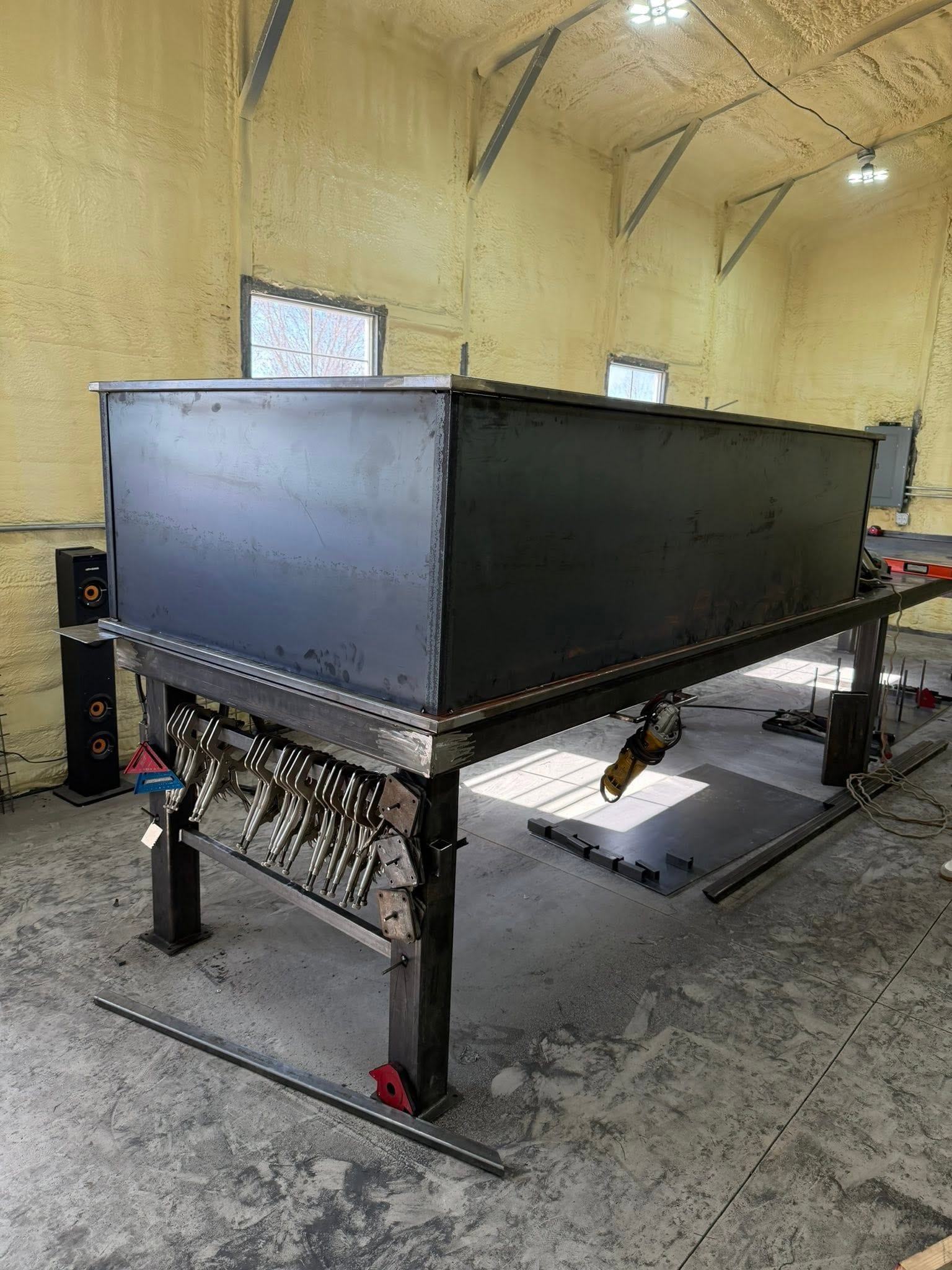 A garden box part-built on the welding table